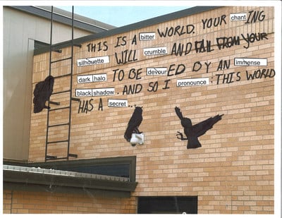 writing on a brick wall